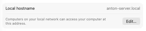 macOS Sharing settings showing the Local hostname row with anton-server.local